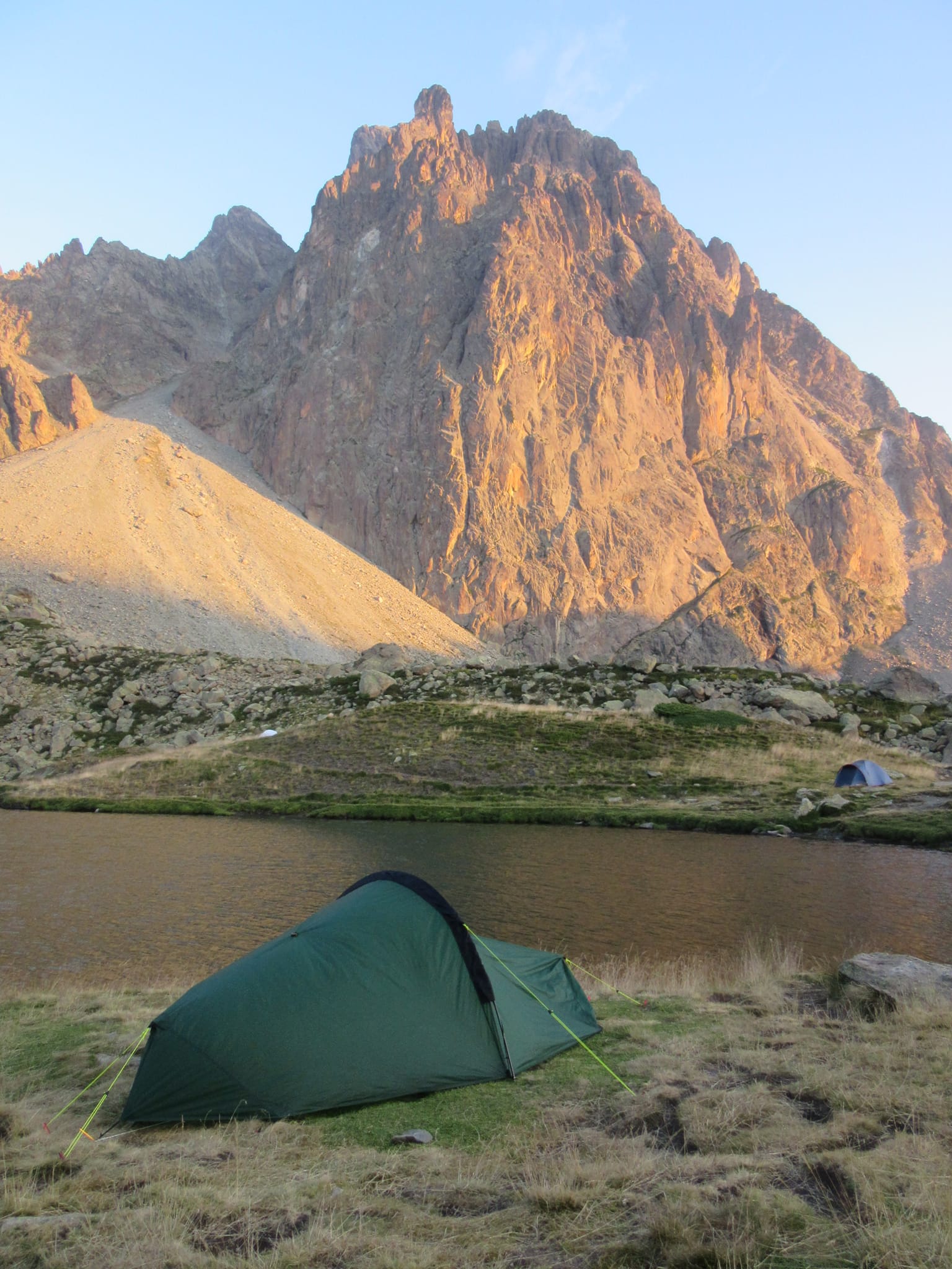 Camped beside Lac de Pombie as the sun sets on Pic du Midi d'Ossau.